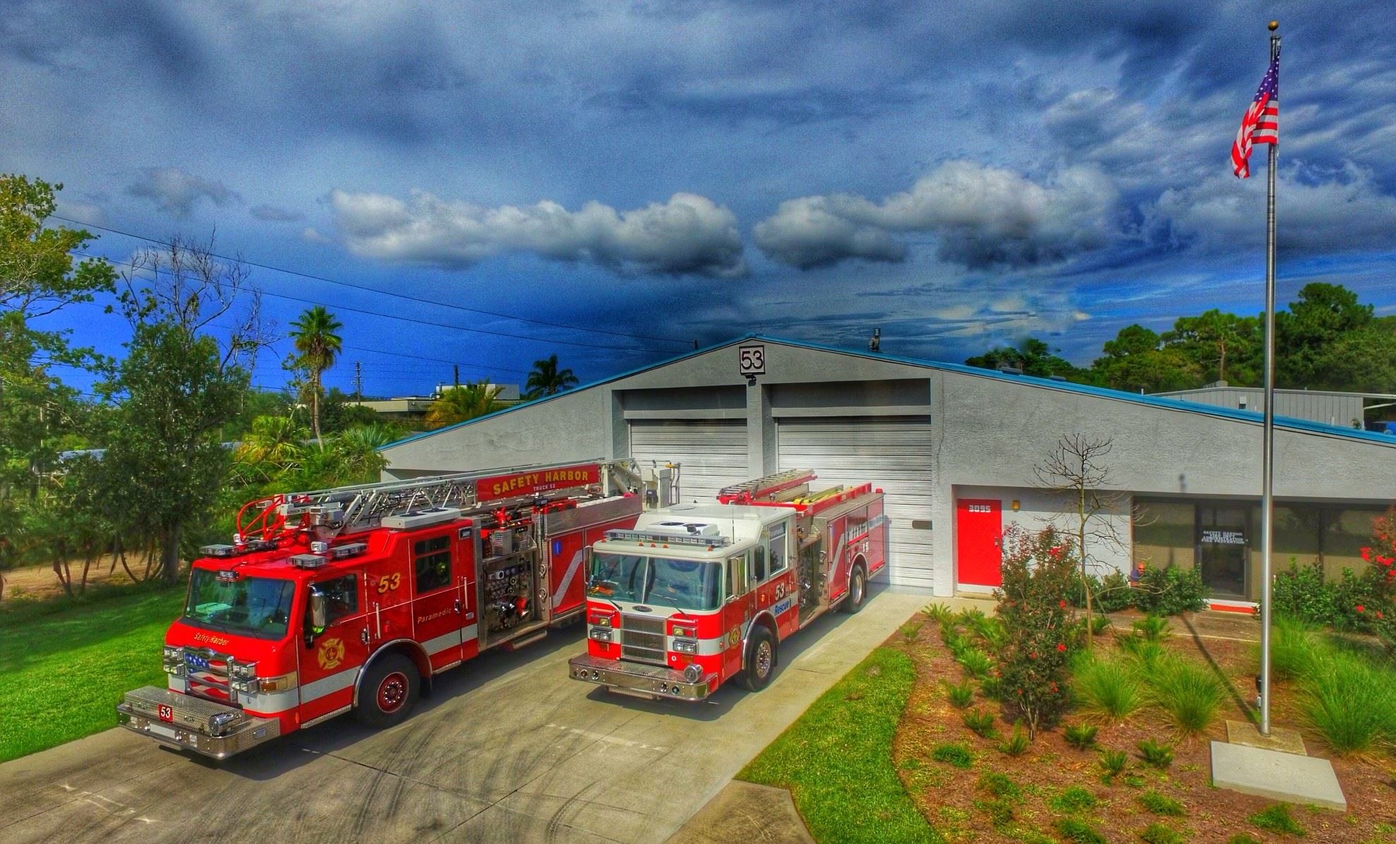 Fire Station 53 aerial view with trucks in driveway