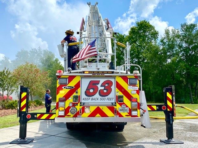 Back of Ladder Truck 53 with ladder raised