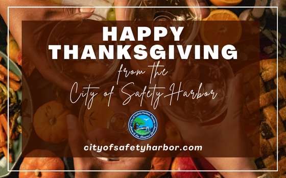Happy Thanksgiving from the City of Safety Harbor over a photo of hands toasting